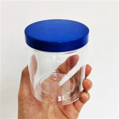 Frascos redondos de plástico con tapas azules